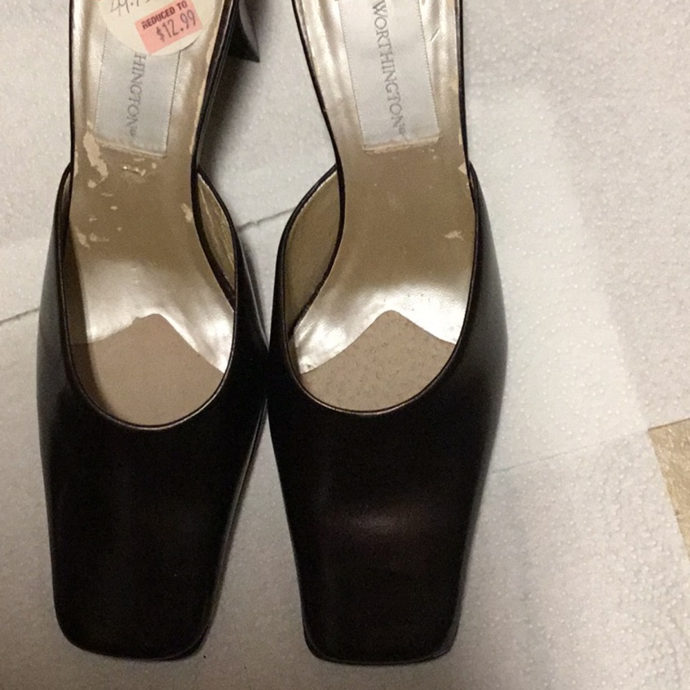 2.5” lady’s heels, leather uppers, synthetic…soles; prior in store reduction.